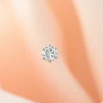 Admire the stunning diamond nose stud, highlighting its intricate design and elegance.